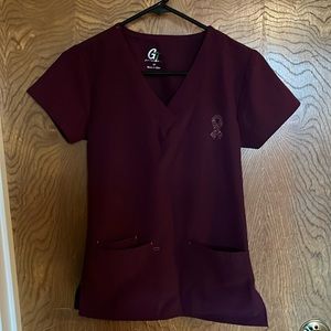 Woman maroon scrub top